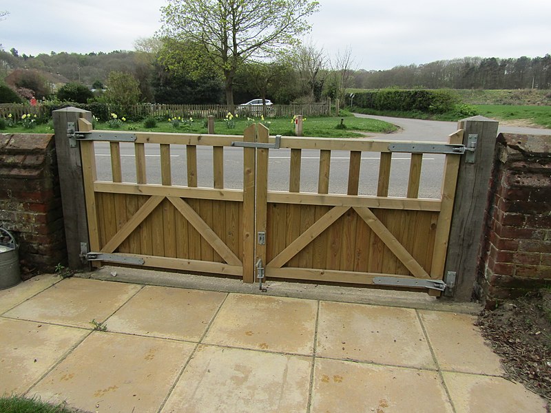 Wooden or metal electric gates – which is right for you - TPS Industrial