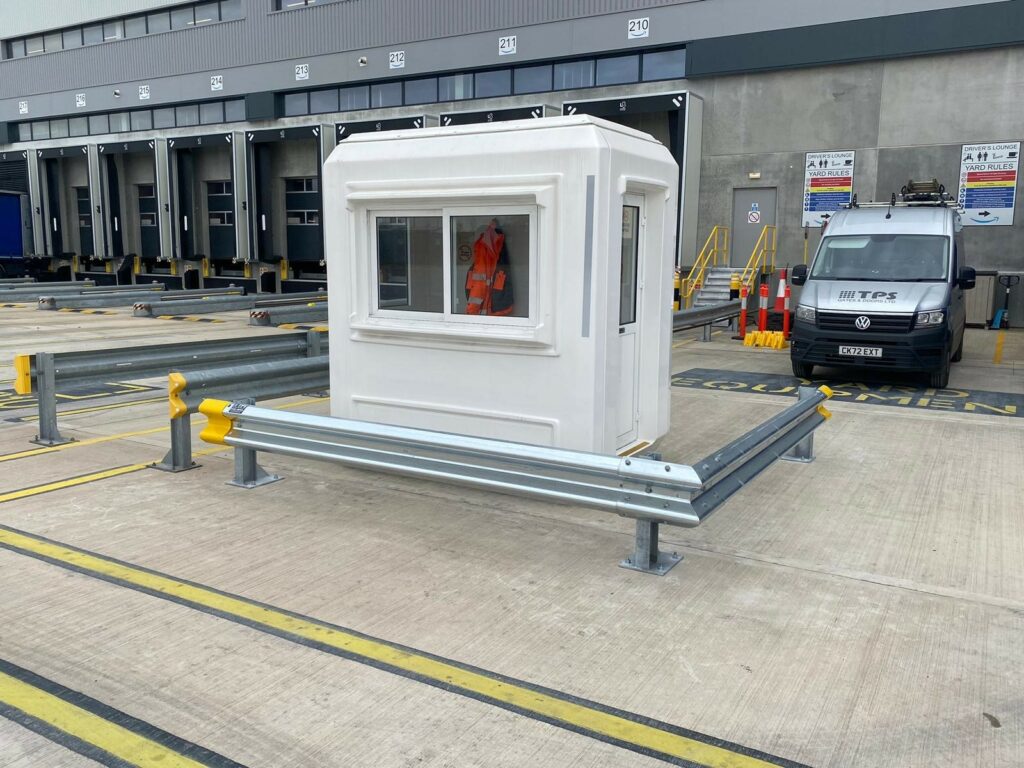 Robust Armco barriers used in factory environments to prevent accidents and ensure safe vehicle movements.