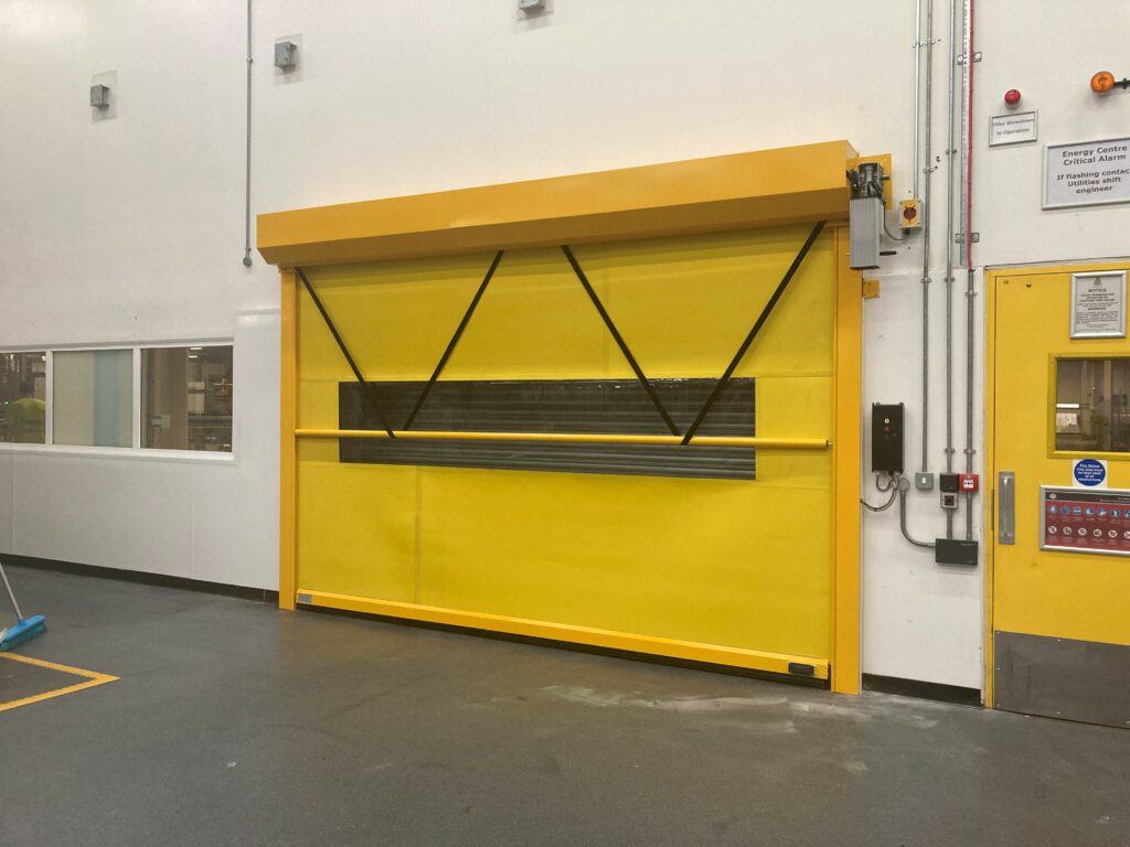Heavy-duty sectional door for large industrial facilities, designed to optimise access while enhancing security.